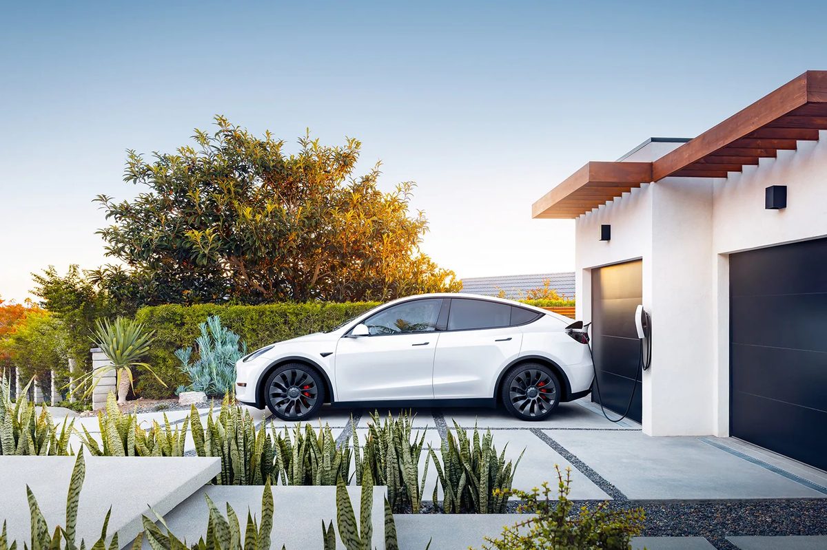 Tesla electric vehicle parked on a residential driveway