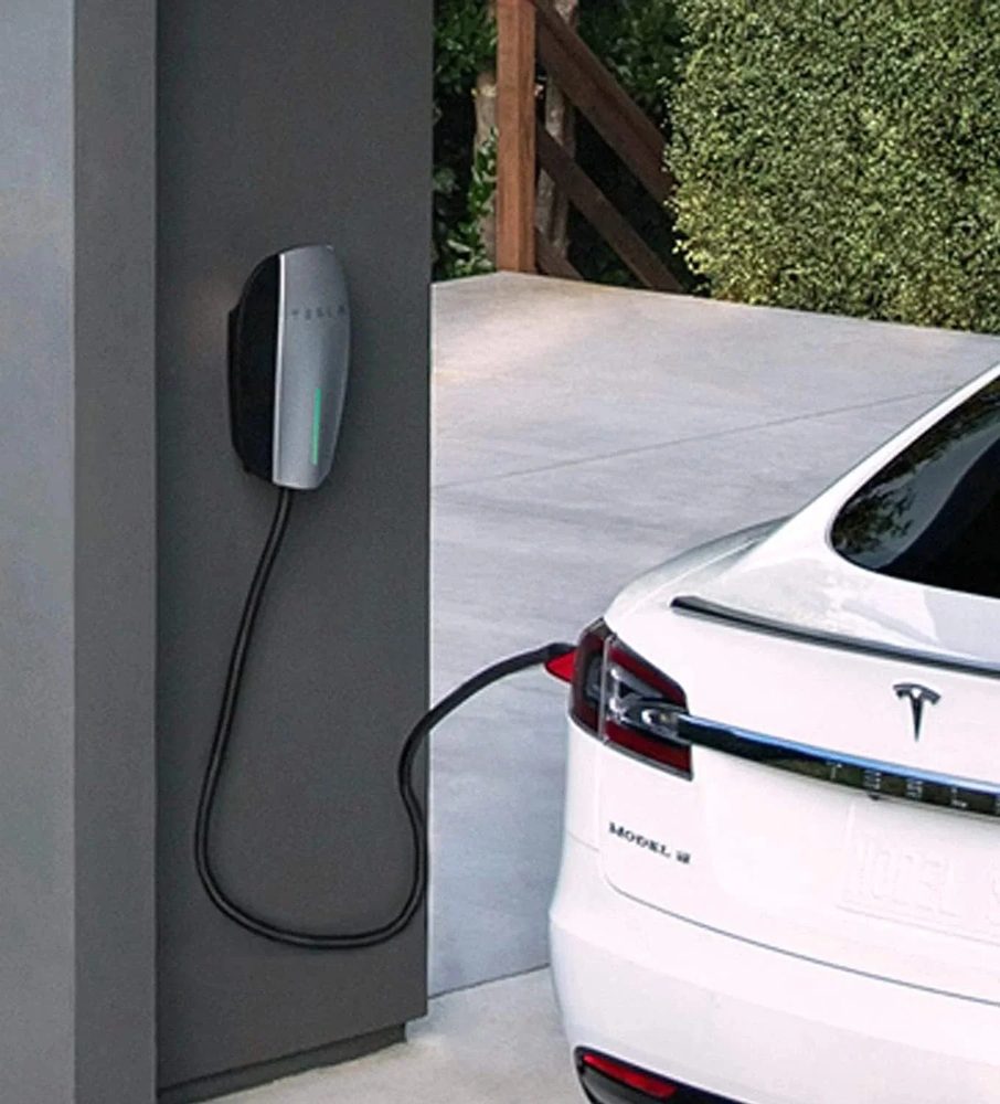 Home wall charging unit installed on a garage wall